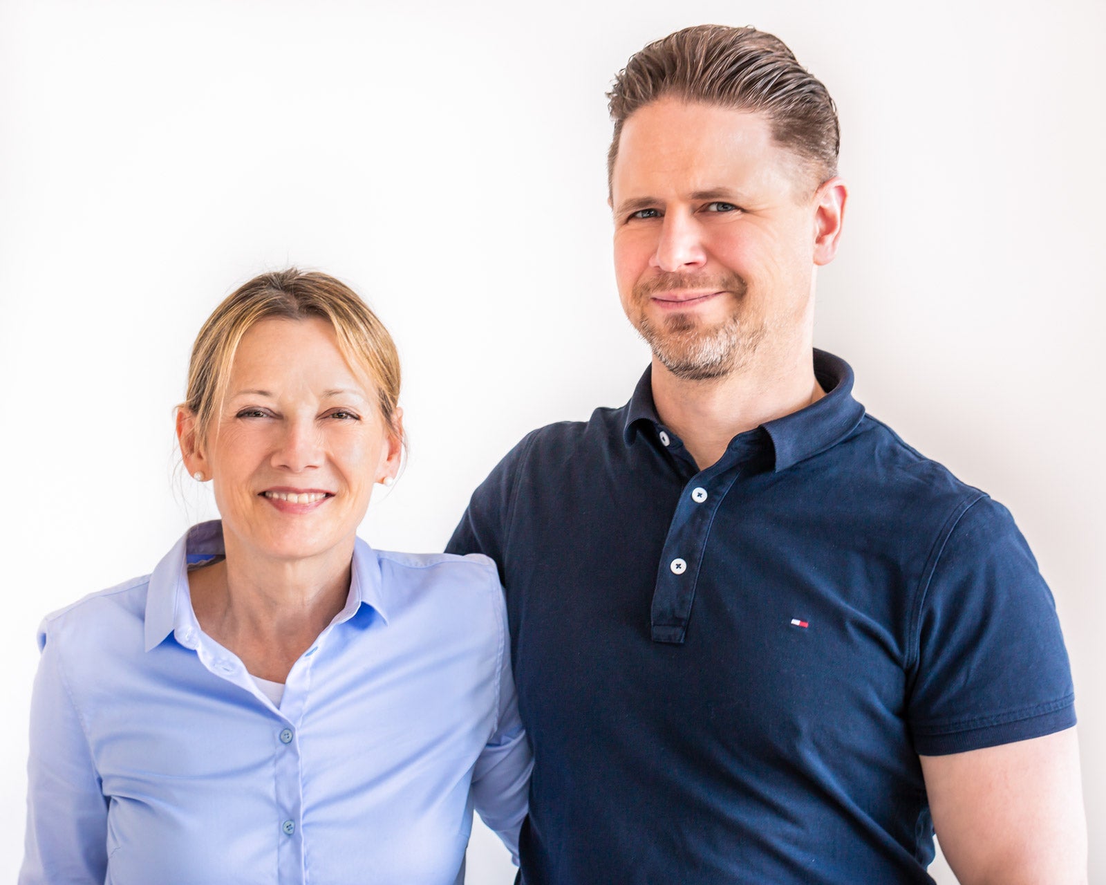 Portrait von Ora Ebeling und Arne Möller.